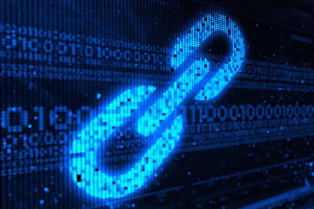 Bright blue link icon against a digital code background highlights the idea of internal linking and how connections work behind the scenes.