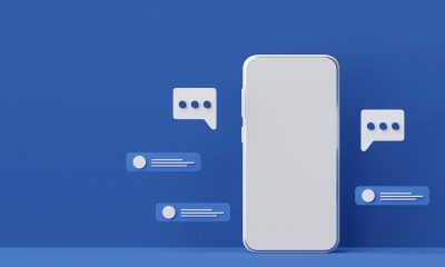 Smartphone against a blue background with notification icons representing social media community building strategies that convert.
